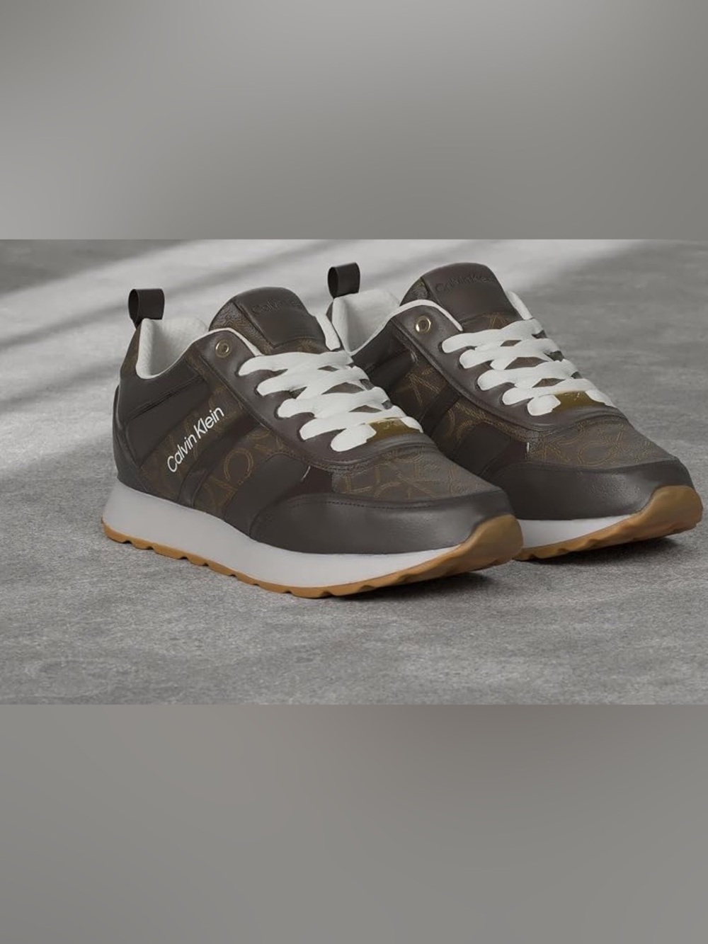 Calvin Klein women’s Dark Brown Monogram Runner Sneakers with White Laces